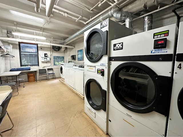 164 W 79th St Unit 4Ab, New York City, NY 10024 - community laundry room featuring stacked washer and clothes dryer and washing machine and clothes dryer