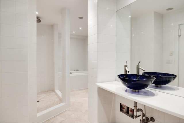 164 W 79th St Unit 4Ab, New York City, NY 10024 - bathroom featuring a walk in shower, a bathtub, tile walls, and tile patterned flooring
