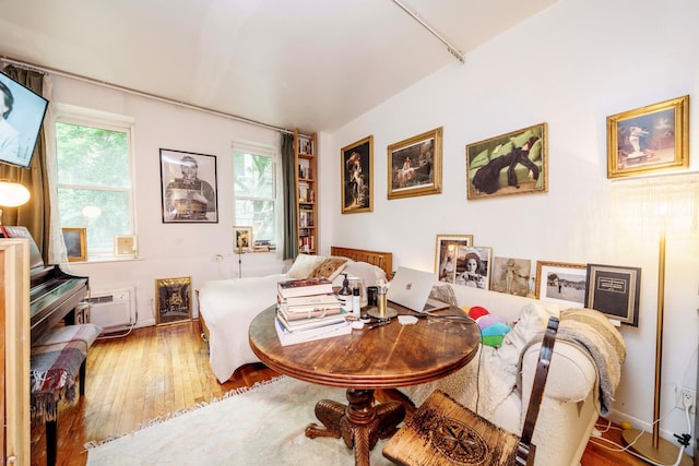 223 E 78th St Unit 2B, New York City, NY 10075 - sitting room featuring hardwood / wood-style floors and a wall mounted air conditioner