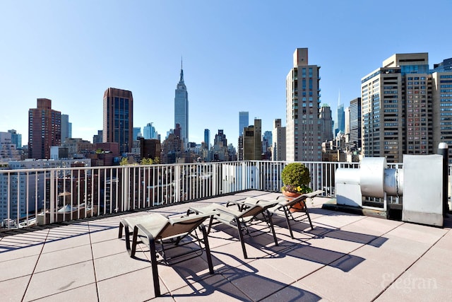 225 E 36th St Unit 1-A, New York City, NY 10016 - view of patio / terrace with a view of skyline