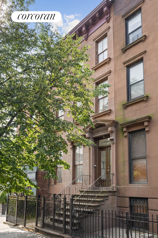130 Greene Ave, New York City, NY 11238 - view of property with a fenced front yard