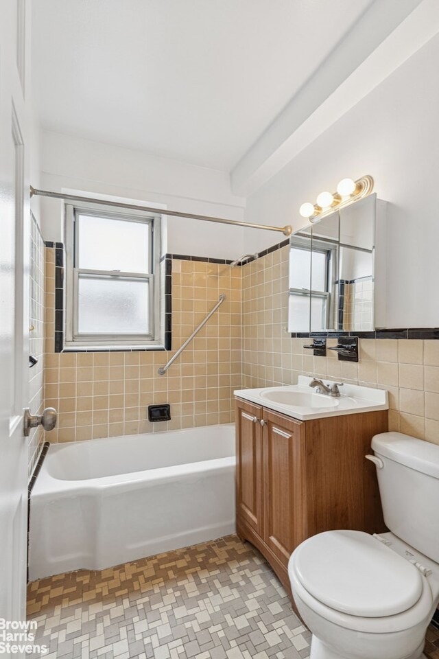 500 Grand St Unit C12A, New York City, NY 10002 - full bath featuring tile walls, vanity, and shower / bathtub combination