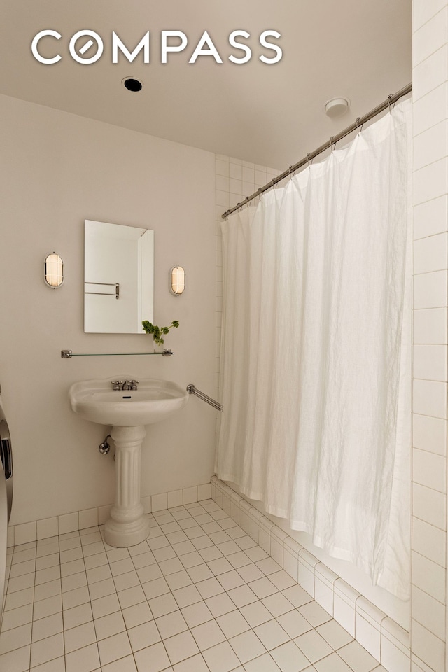 32 W 20th St Unit 9B, New York City, NY 10011 - bathroom featuring tile patterned flooring