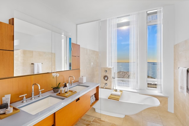2 River Ter Unit Rh-8, New York City, NY 10282 - full bathroom featuring a soaking tub and double vanity