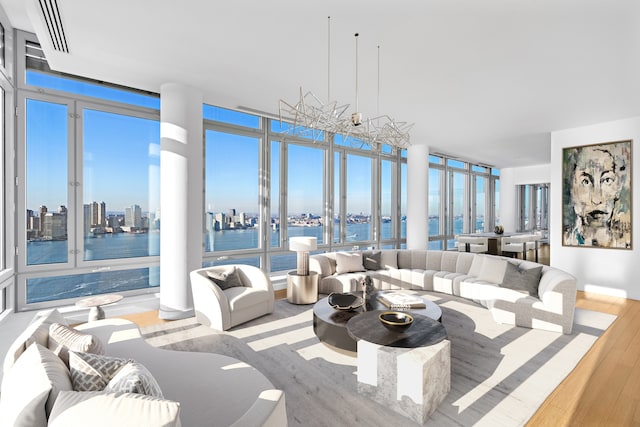 2 River Ter Unit Rh-8, New York City, NY 10282 - living room with a water view and wood finished floors