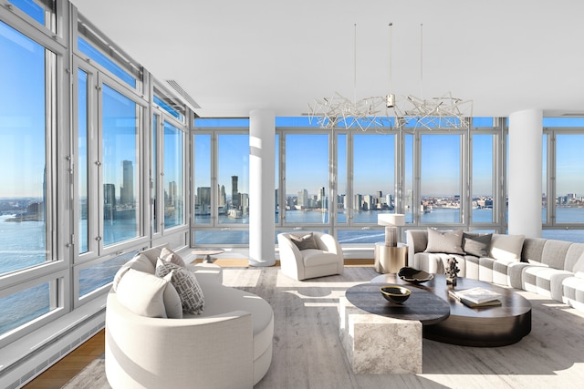 2 River Ter Unit Rh-8, New York City, NY 10282 - sunroom featuring a view of skyline and a water view