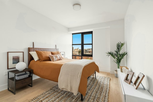 11 Hancock Pl Unit 501, New York City, NY 10027 - bedroom featuring light wood-style flooring and baseboards