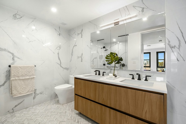 11 Hancock Pl Unit 501, New York City, NY 10027 - full bath featuring tile walls, double vanity, and a marble finish shower
