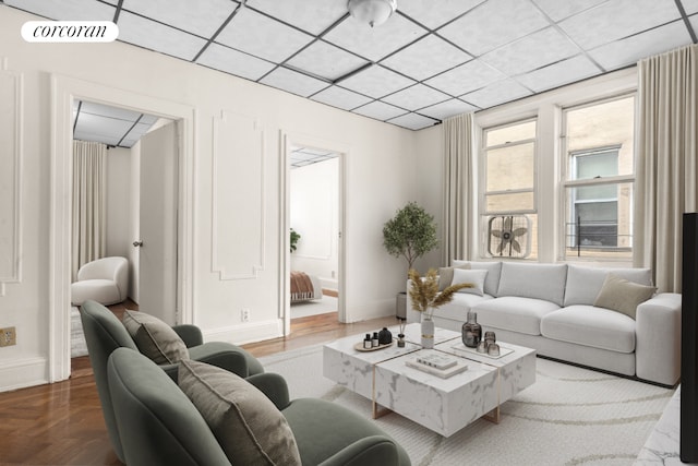 845 Bay Ridge Ave, New York City, NY 11220 - living area featuring baseboards and a drop ceiling