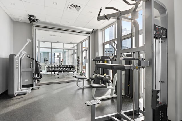 500 W 43rd St Unit 21-B, New York City, NY 10036 - workout area with a drop ceiling and floor to ceiling windows