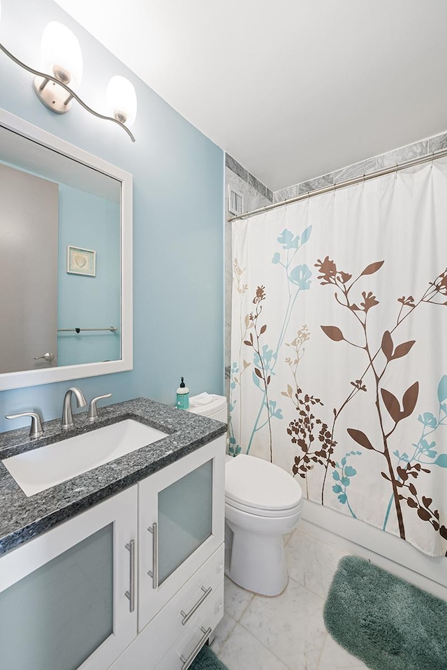 500 W 43rd St Unit 21-B, New York City, NY 10036 - full bath featuring vanity, marble finish flooring, and curtained shower