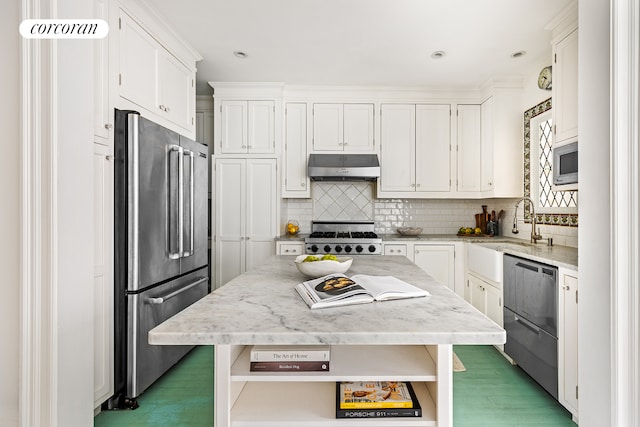 215 W 91st St Unit 76, New York City, NY 10025 - kitchen featuring appliances with stainless steel finishes, under cabinet range hood, open shelves, white cabinetry, and tasteful backsplash