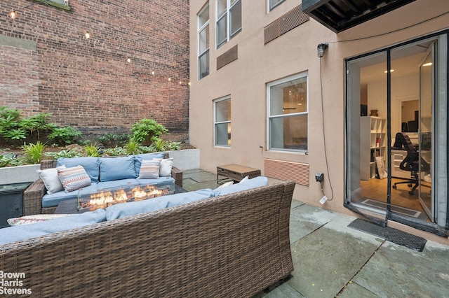 302 W 122nd St Unit 1, New York City, NY 10027 - view of patio featuring an outdoor living space with a fire pit
