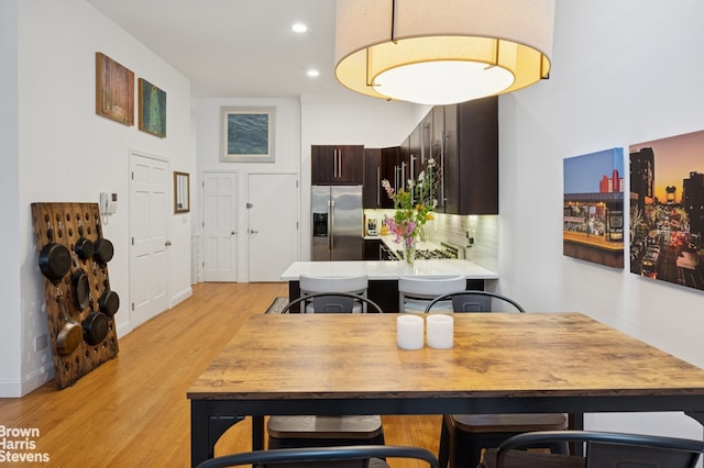 302 W 122nd St Unit 1, New York City, NY 10027 - dining area with light wood-type flooring and recessed lighting