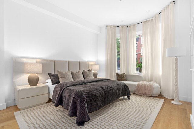 205 14th St Unit Th, New York City, NY 11215 - bedroom featuring light wood-style flooring and baseboards