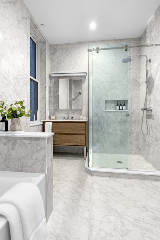 205 14th St Unit Th, New York City, NY 11215 - full bathroom with a marble finish shower, vanity, marble finish flooring, and a bath