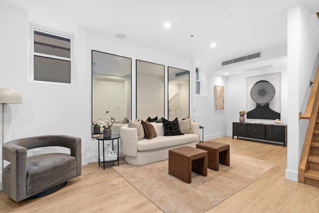 205 14th St Unit Th, New York City, NY 11215 - living room featuring stairs, light wood-style flooring, and recessed lighting