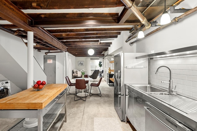222 E 17th St Garden, Unit Garden, New York City, NY 10003 - kitchen with stainless steel appliances, concrete floors, backsplash, and wood counters