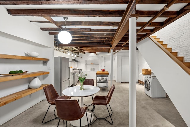 222 E 17th St Garden, Unit Garden, New York City, NY 10003 - dining area with concrete floors, stairway, and washing machine and clothes dryer