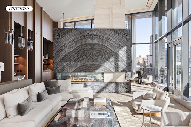 30 Riverside Blvd Unit 21G, New York City, NY 10069 - building lobby with a high ceiling, floor to ceiling windows, and a view of city