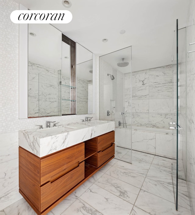 30 Riverside Blvd Unit 21G, New York City, NY 10069 - bathroom with marble finish flooring, a marble finish shower, double vanity, a tub with marble appearance, and tile walls