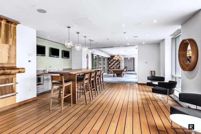 2 River Ter Unit 9-A, New York City, NY 10282 - dining room featuring billiards table, light wood-type flooring, and recessed lighting