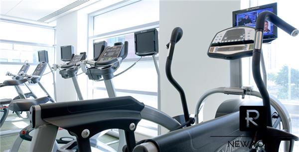 2 River Ter Unit 9-A, New York City, NY 10282 - gym featuring healthy amount of natural light