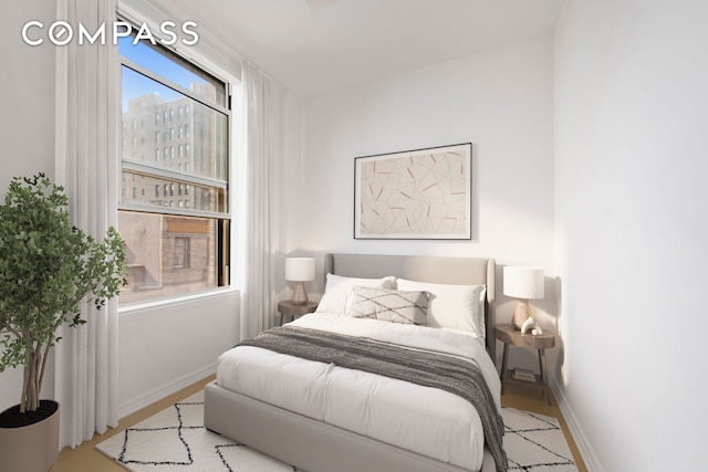 214 Mulberry St Unit 6B, New York City, NY 10012 - bedroom featuring wood finished floors