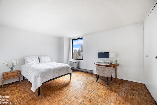 1619 3rd Ave Unit 17J, New York City, NY 10128 - bedroom with baseboards and a baseboard radiator