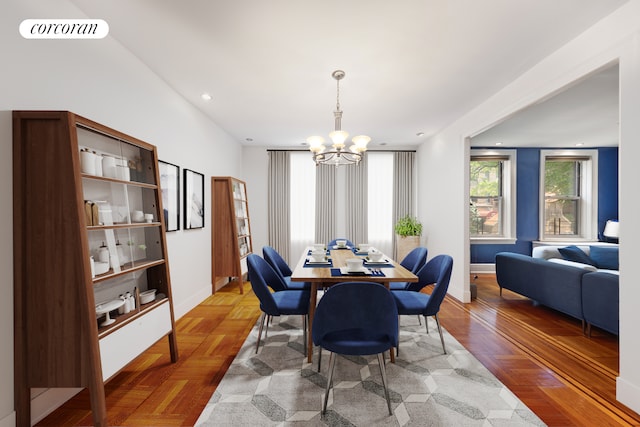 37-16 80th St Unit 1, New York City, NY 11372 - dining area featuring a chandelier and baseboards