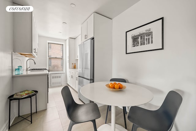 2525 Nostrand Ave Unit 3F, New York City, NY 11210 - dining room featuring light tile patterned flooring and baseboards