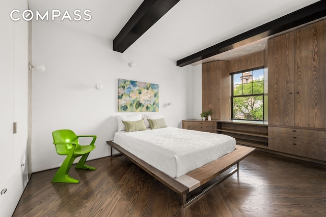170 2nd Ave Unit 5A, New York City, NY 10003 - bedroom with beamed ceiling and dark wood-style flooring