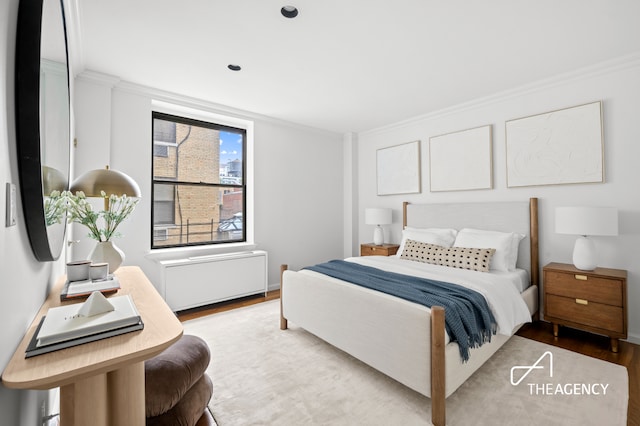 112 E 83rd St Unit 7A, New York City, NY 10028 - bedroom with wood finished floors and ornamental molding