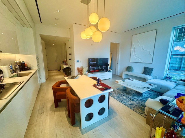 200 E 59th St Unit 8B, New York City, NY 10022 - living area with light wood-style flooring