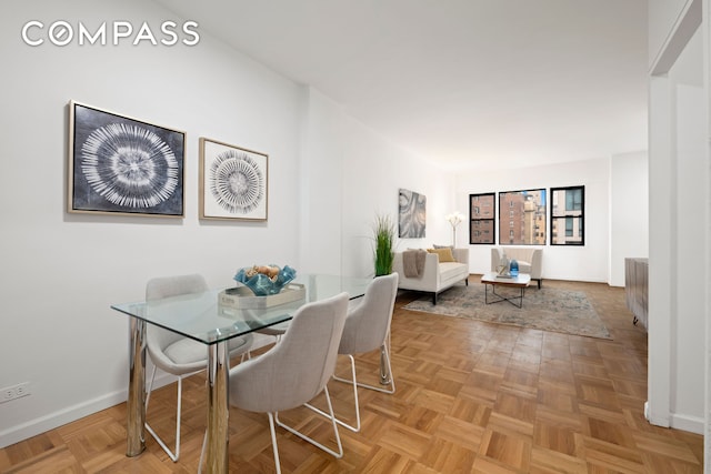 201 E 21st St Unit 15C, New York City, NY 10010 - dining room with baseboards