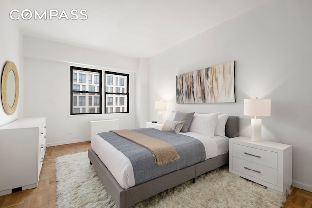 201 E 21st St Unit 15C, New York City, NY 10010 - bedroom with baseboards