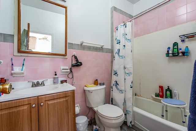 298 12th St Unit 4F, New York City, NY 11215 - bathroom with tile walls, vanity, and shower / tub combo