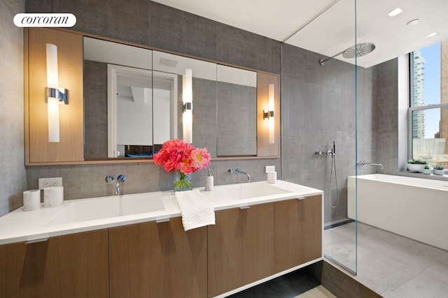 270 Broadway Unit 18C, New York City, NY 10007 - full bath featuring double vanity, walk in shower, and a soaking tub