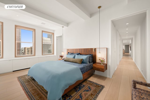 270 Broadway Unit 18C, New York City, NY 10007 - bedroom with light wood-style flooring, recessed lighting, and wainscoting