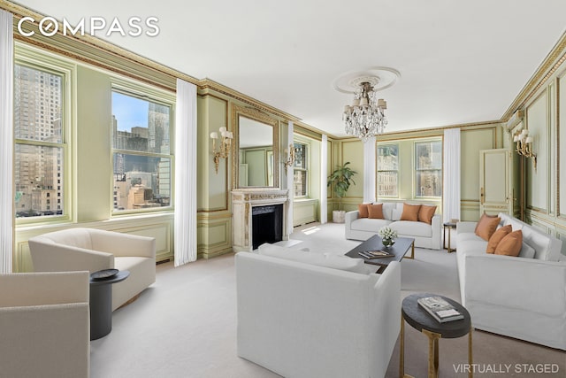 781 5th Ave Unit 17, New York City, NY 10022 - living area with a decorative wall, light carpet, a chandelier, wainscoting, and a fireplace