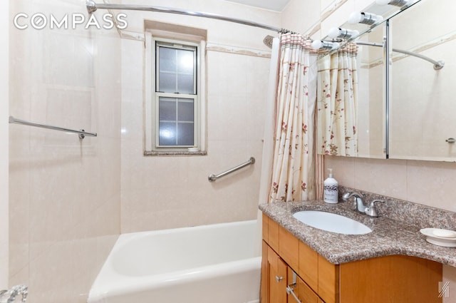 79-15 35th Ave Unit 3E, New York City, NY 11372 - full bathroom featuring shower / bath combo with shower curtain and vanity