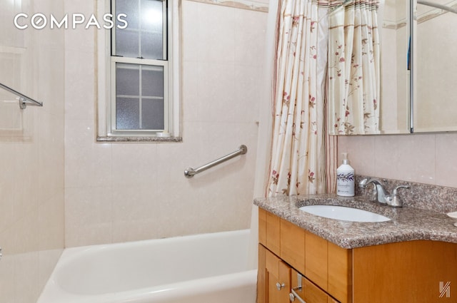 79-15 35th Ave Unit 3E, New York City, NY 11372 - full bathroom featuring vanity and shower / bath combo with shower curtain
