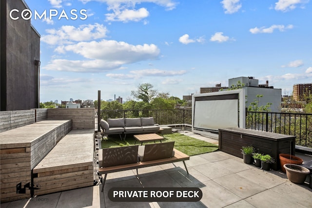299 Van Buren St Unit 4C, New York City, NY 11221 - view of patio / terrace with an outdoor living space and a view of city