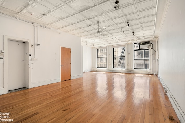 547 Broadway Unit 3, New York City, NY 10012 - unfurnished living room featuring light wood-type flooring and ceiling fan