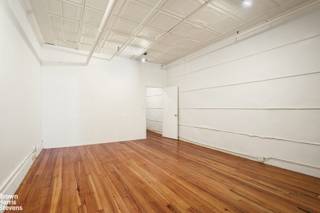 547 Broadway Unit 3, New York City, NY 10012 - unfurnished room featuring hardwood / wood-style floors and an ornate ceiling