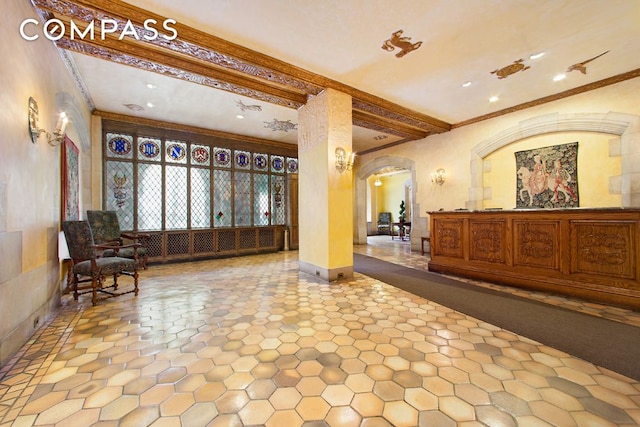 25 Tudor City Pl Unit 1405, New York City, NY 10017 - lobby with ornamental molding and recessed lighting