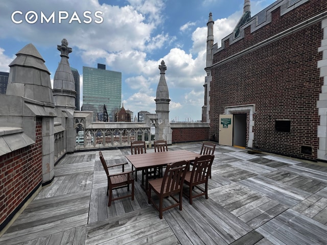25 Tudor City Pl Unit 1405, New York City, NY 10017 - wooden deck featuring outdoor dining area