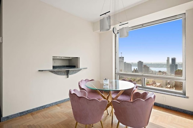 301 W 57th St Unit 27A, New York City, NY 10019 - dining space with a view of city and a water view