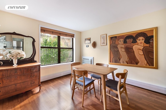 446 W 47th St Unit 3C, New York City, NY 10036 - dining room with wood finished floors and baseboards
