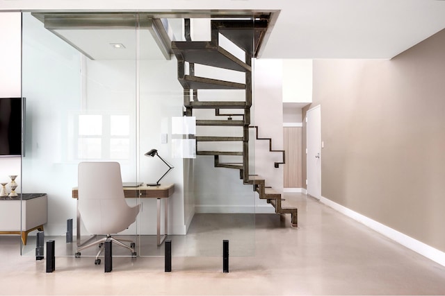 135 W 70th St Unit 10C, New York City, NY 10023 - office area with concrete floors and baseboards